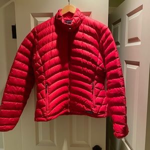 Patagonia down jacket packable in a fire engine red in size L.